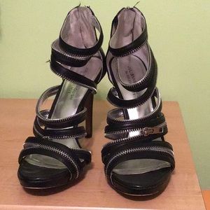 Black sandals with zipper detail
